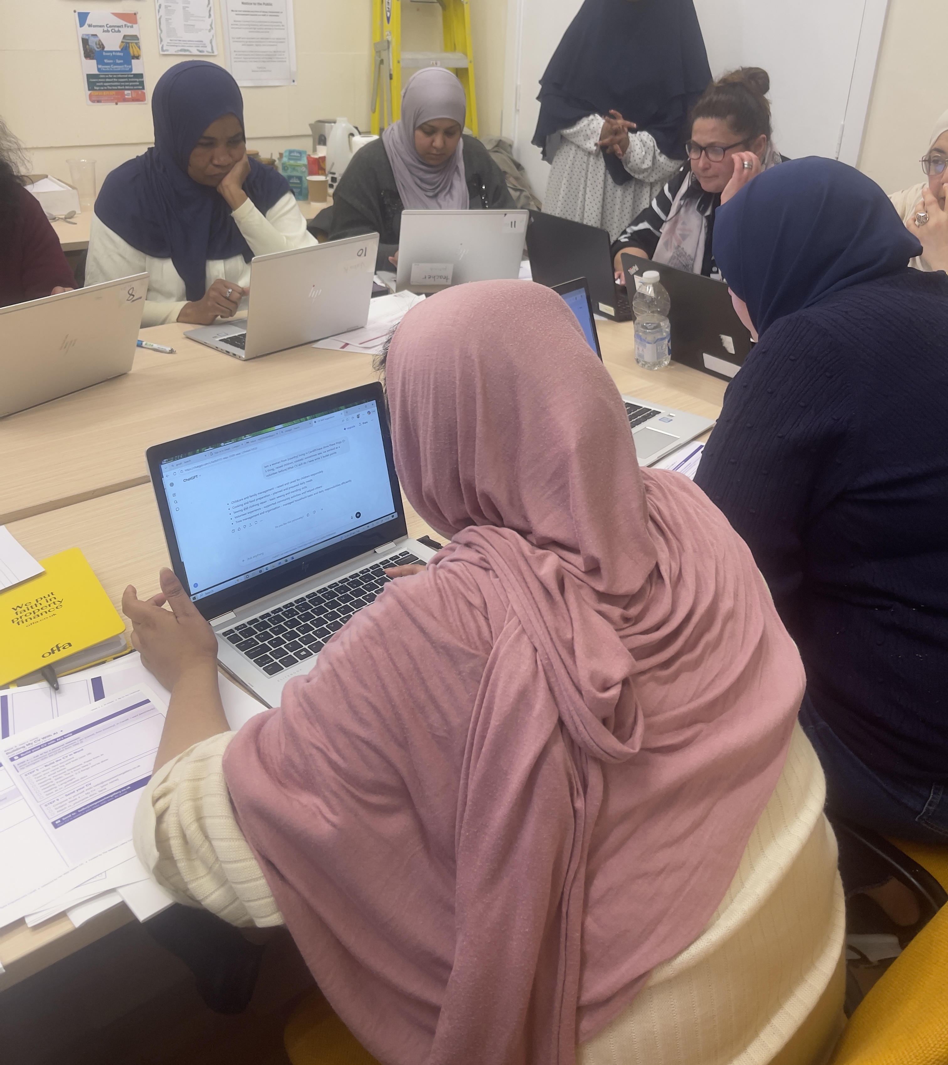 Participants working on laptops during a Her Web Impact digital skills workshop